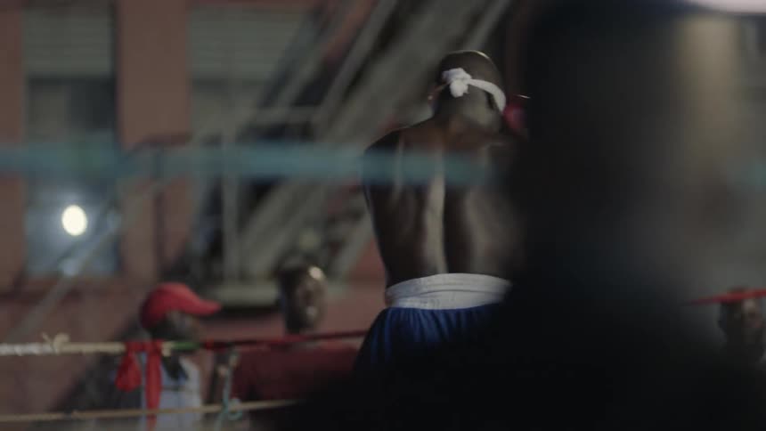 Two men boxing with one man blindfolded