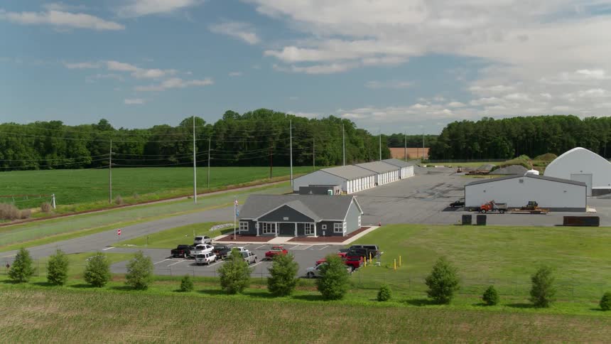Buildings stand in a rural area