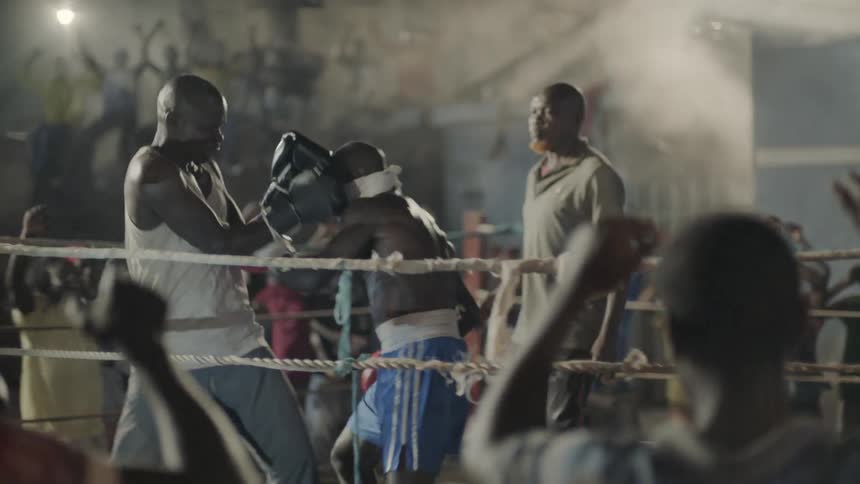 Two men boxing with one man blindfolded