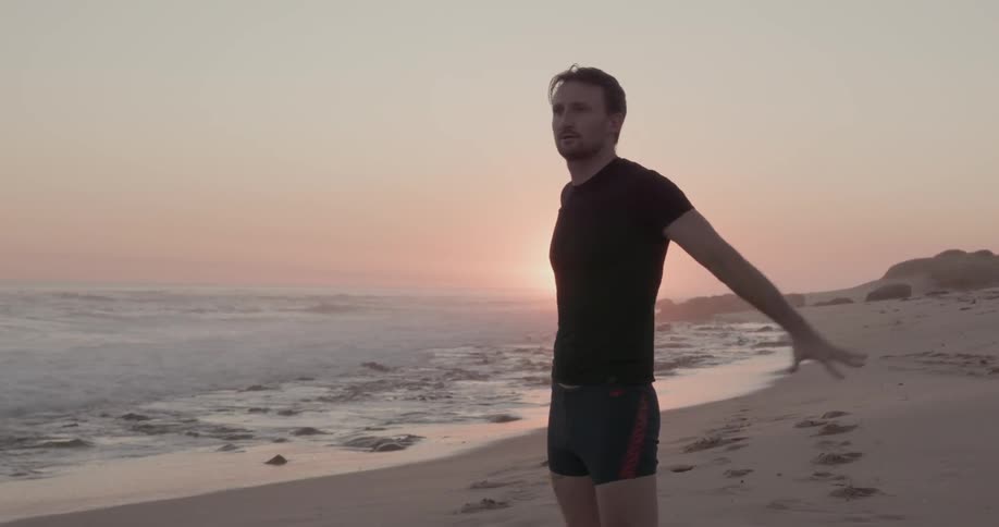 Man Exercising On The Beach