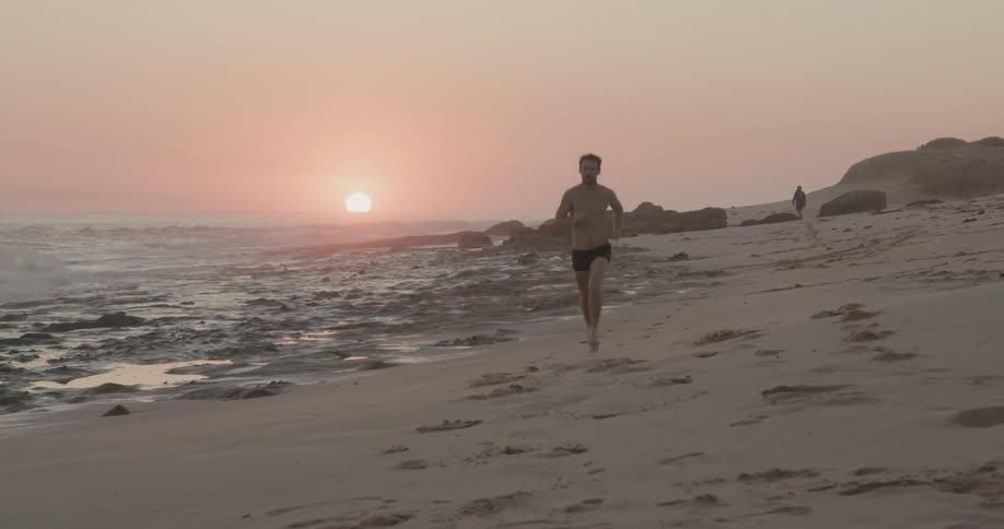 Man Exercising On The Beach