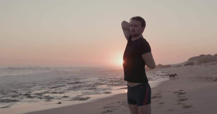 Man Exercising On The Beach