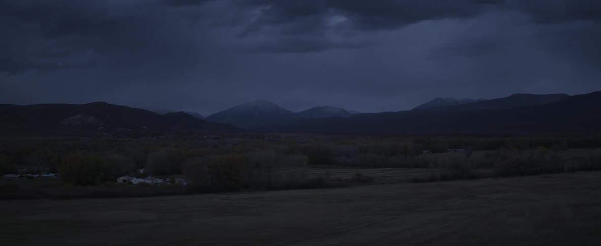 Clouds float over a desert