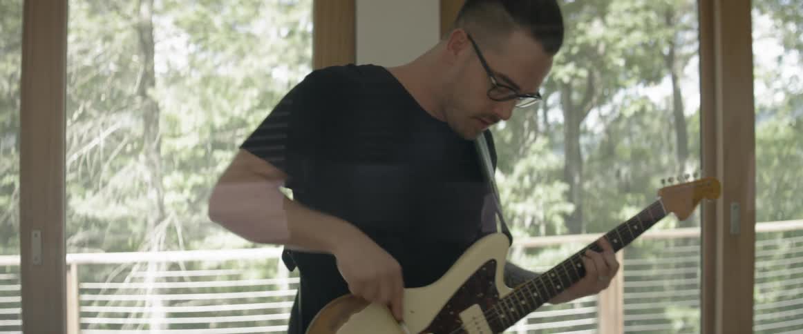 Musicians Recording Music In Forest Studio