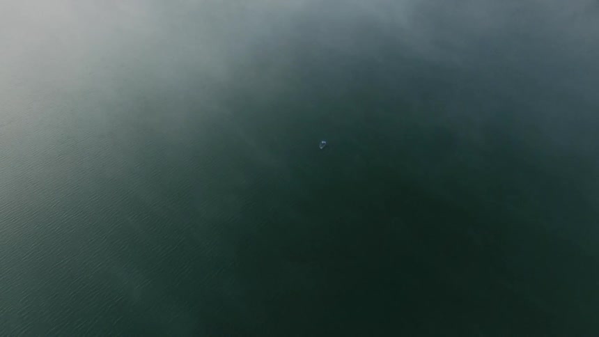 Small boats travels over the water