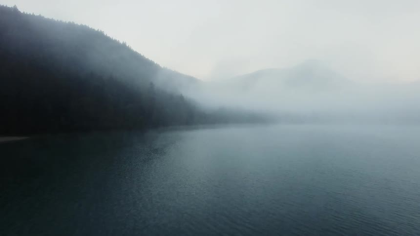 Mist floats over the lake