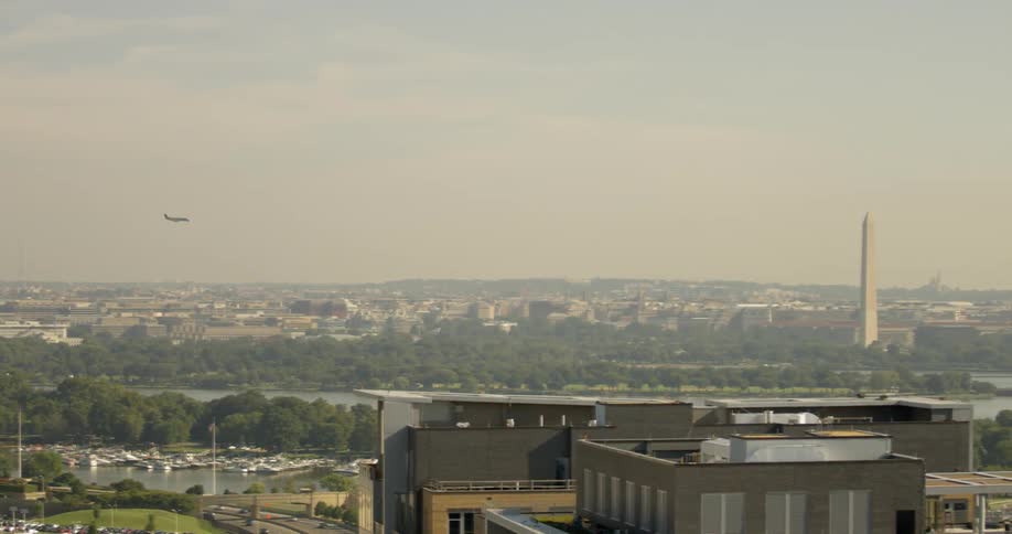 Airplane is flying over the pentagon and Washington DC