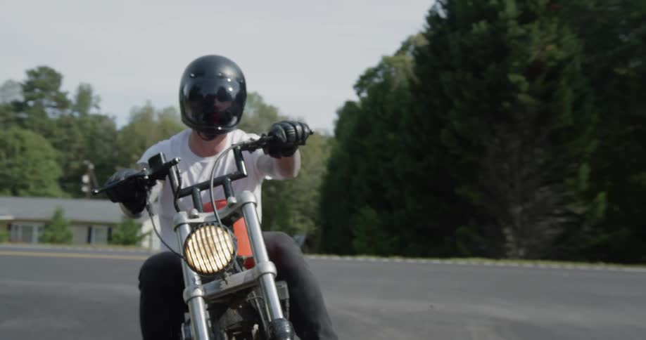 Man rides motorcycle