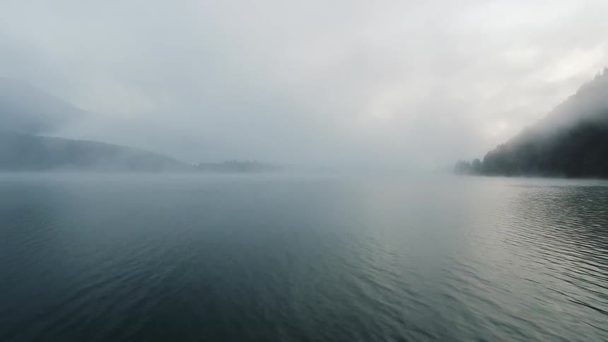 Mist over a mountain lake