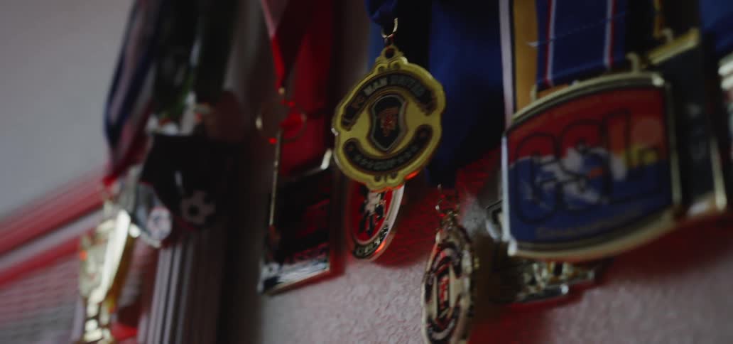 Medals hang on a wall