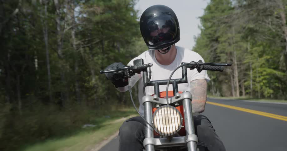Man Riding Motorcycle