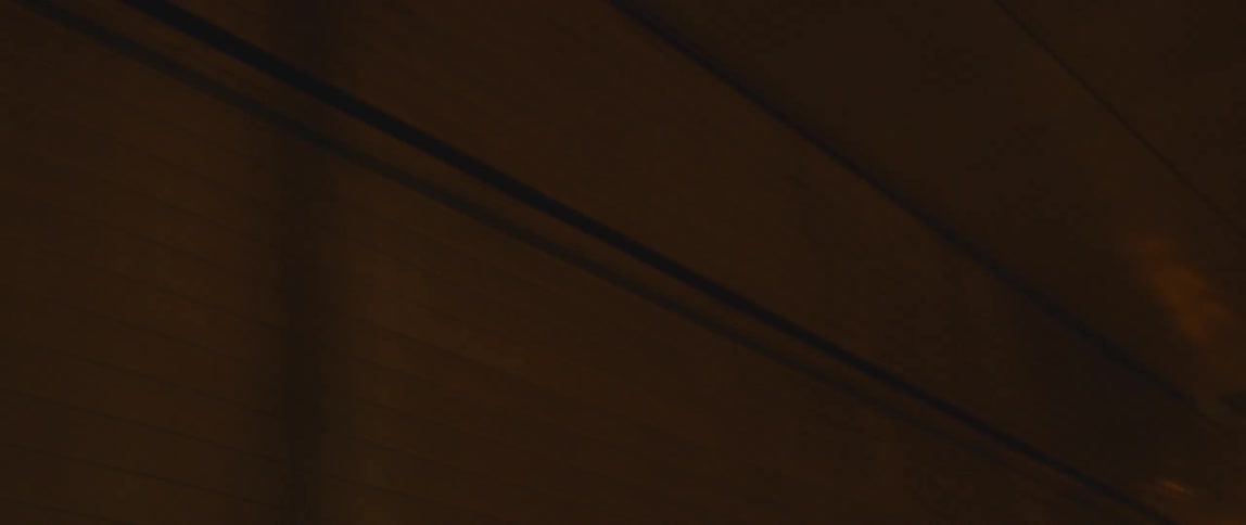 A car drives through a tunnel