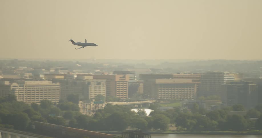 Airplane descends over washington dc
