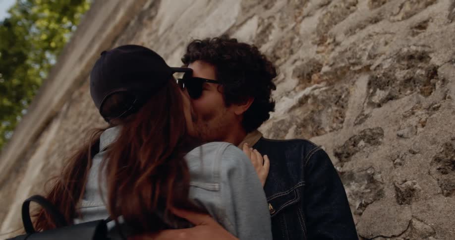 A man and woman kiss