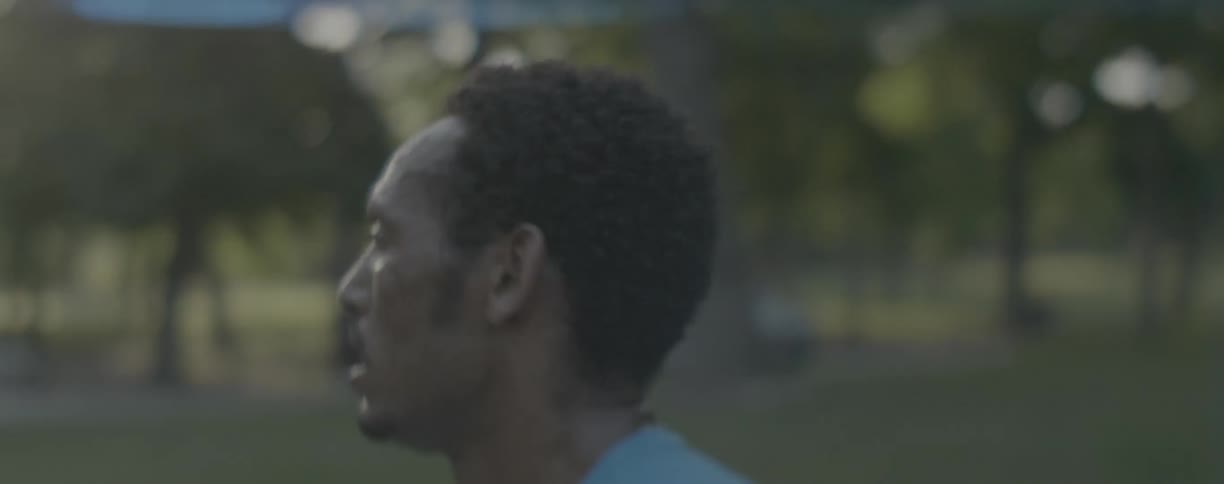 Man is jogging outside during the say