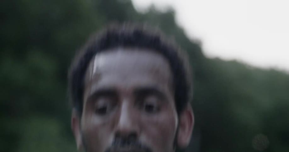 Man jogs on a rural road