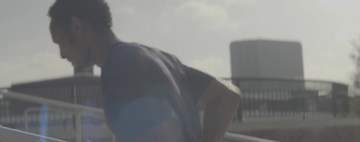 A man sprints up city steps