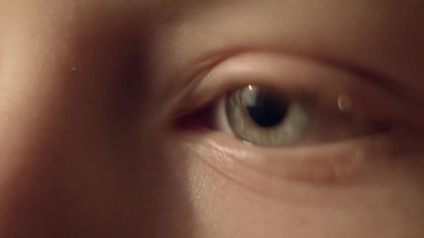 An eye blinks and looks around