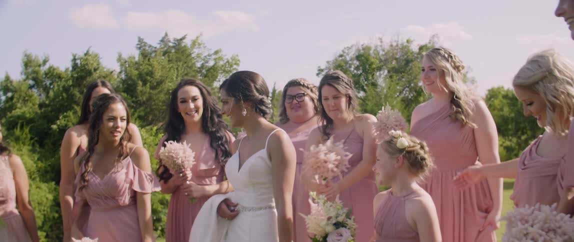 Bride with bridesmaids and flower girl