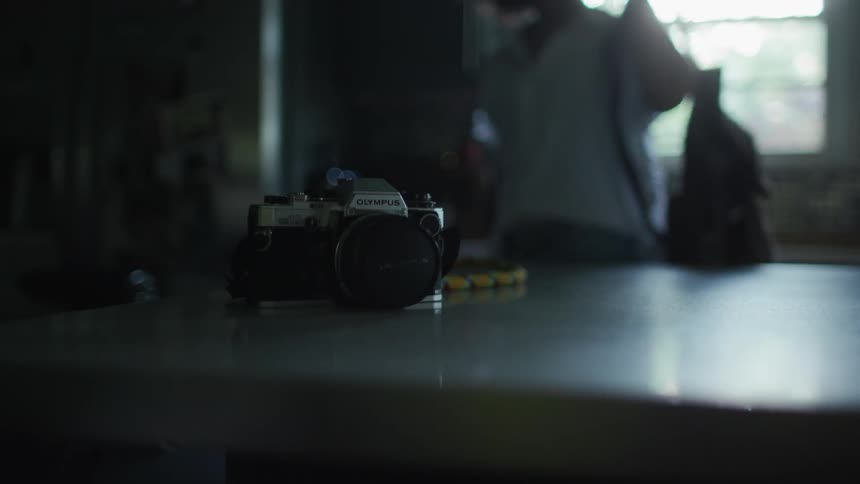 A camera sits on the kitchen counter