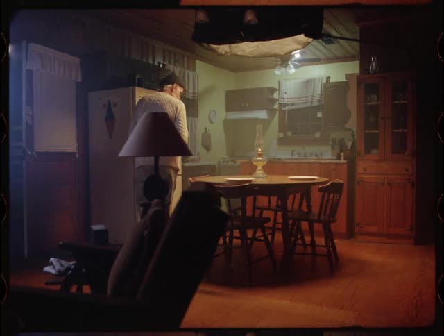 Elderly Man Living In Cabin