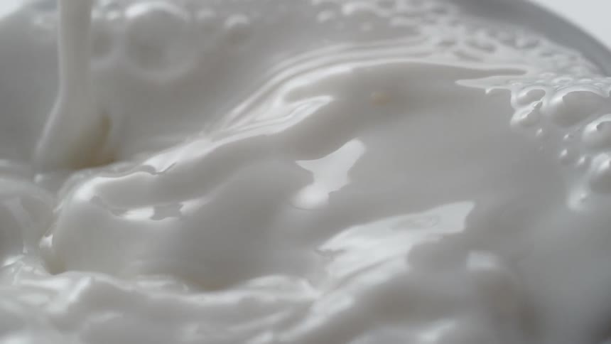 Milk pouring and splashing
