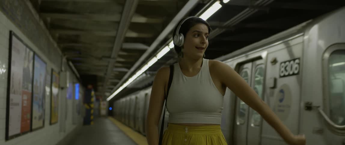 Woman dancing in the subway