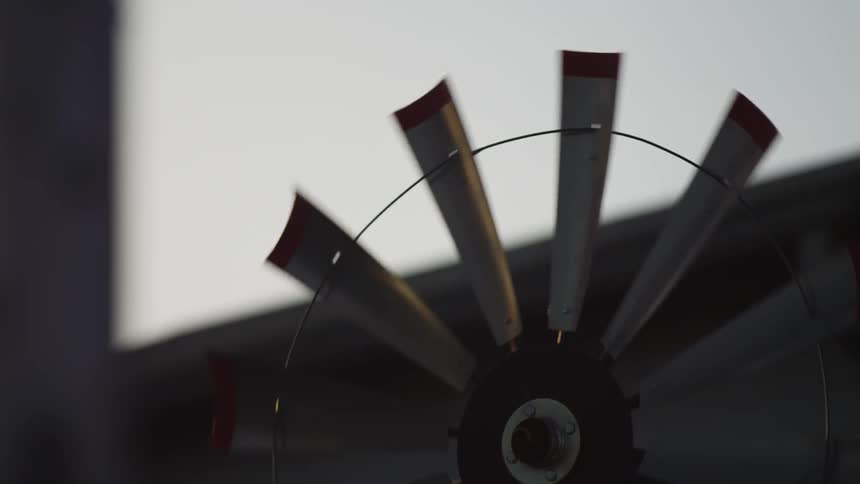 A weathervane spins in the wind