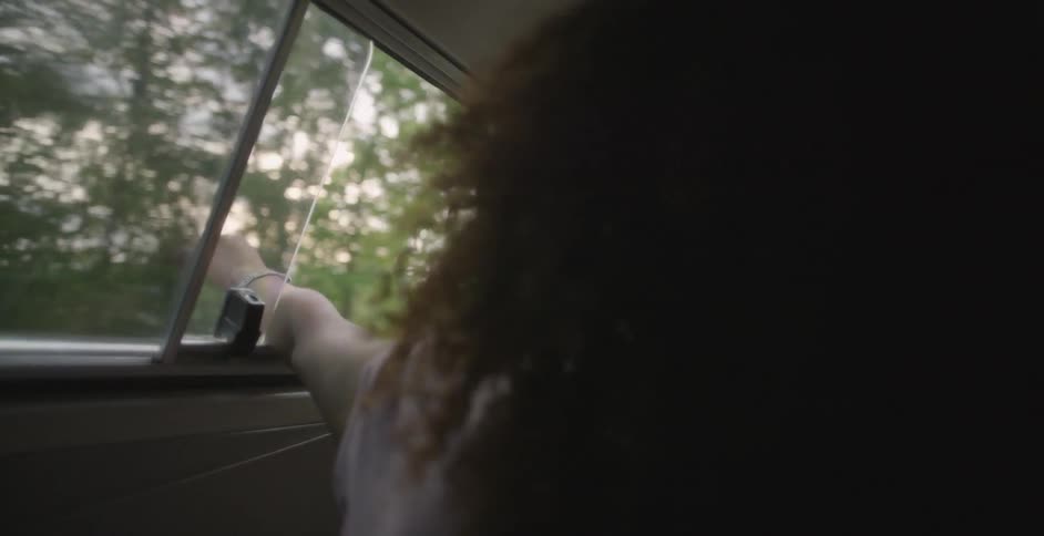 A person sitting in a car