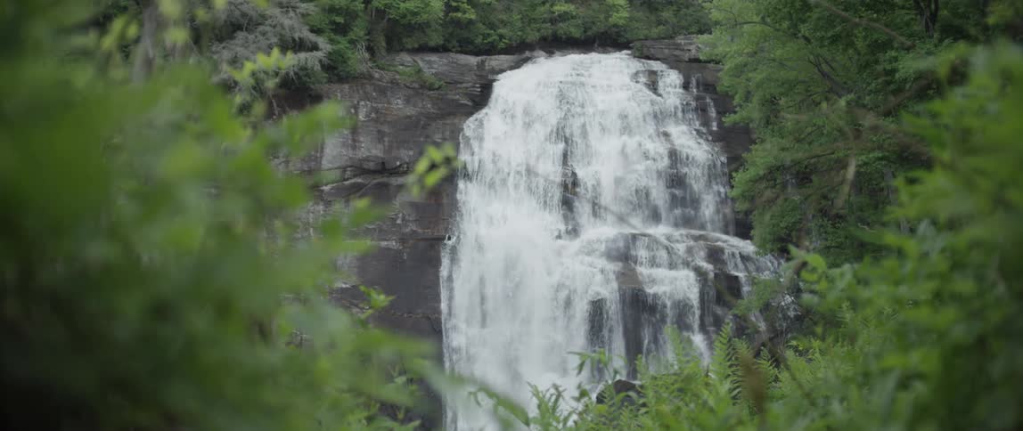 A waterfall rolling down a cliff side