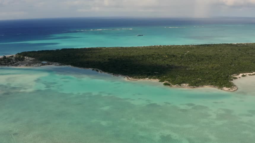 The island is full of green on a sunny day