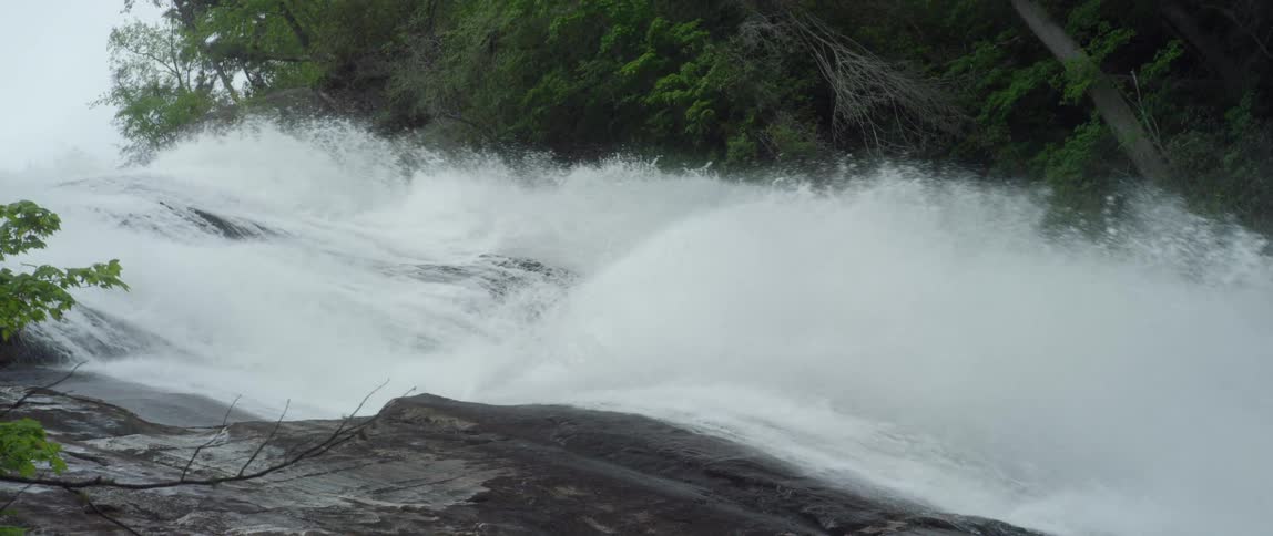 A river rushing and crashing along rocks