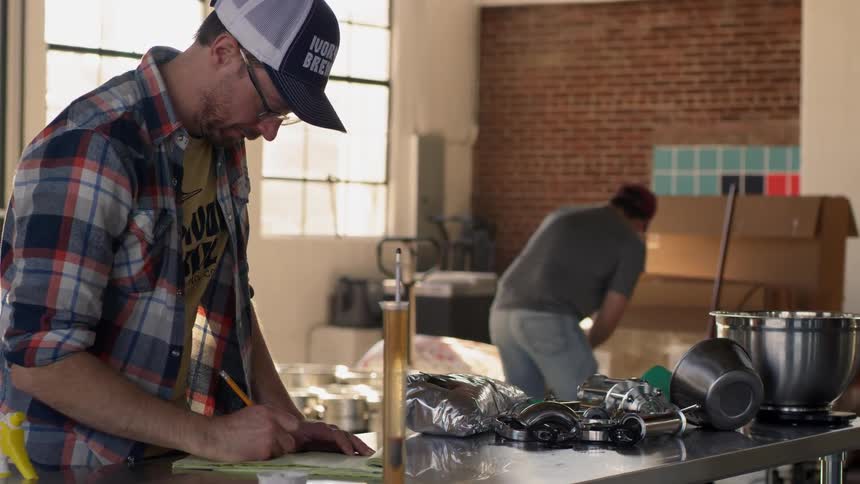 Men work together in the warehouse