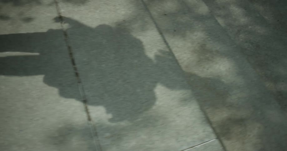 A person is walking down the steps