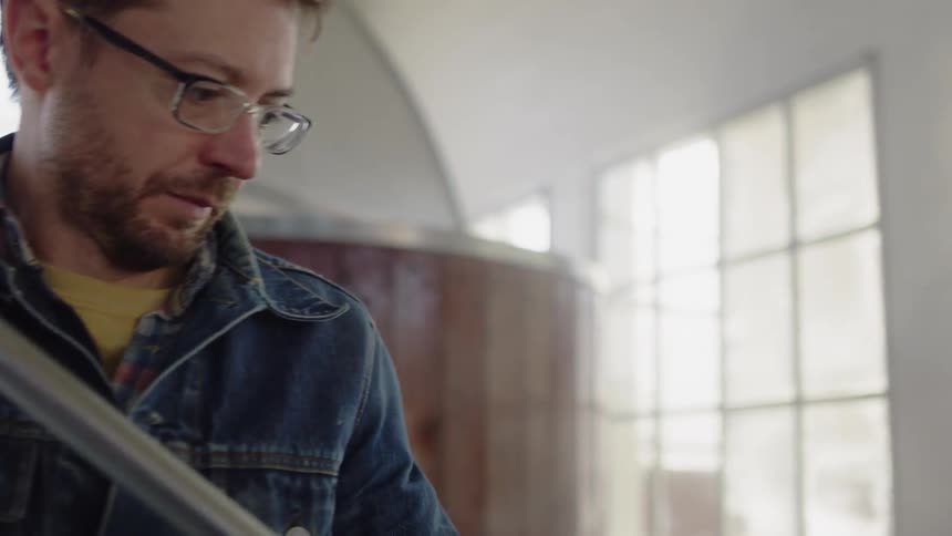 Man Working In Brewery