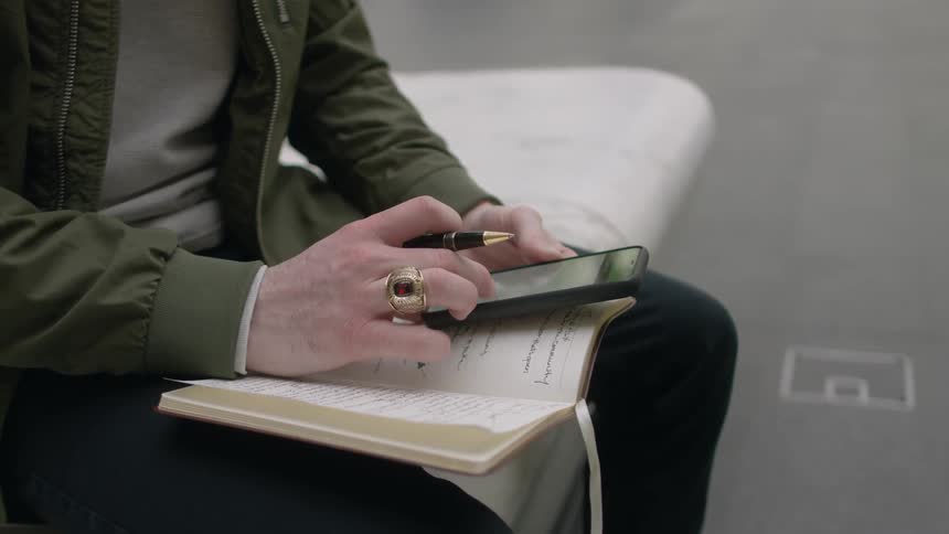 A man is using his phone