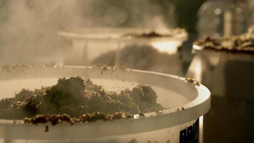 The steam rises from the containers