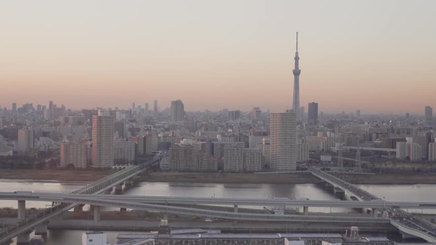 The intersecting bridges lead into the city