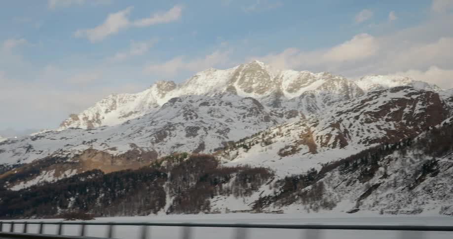 Snow covers a mountain landscape