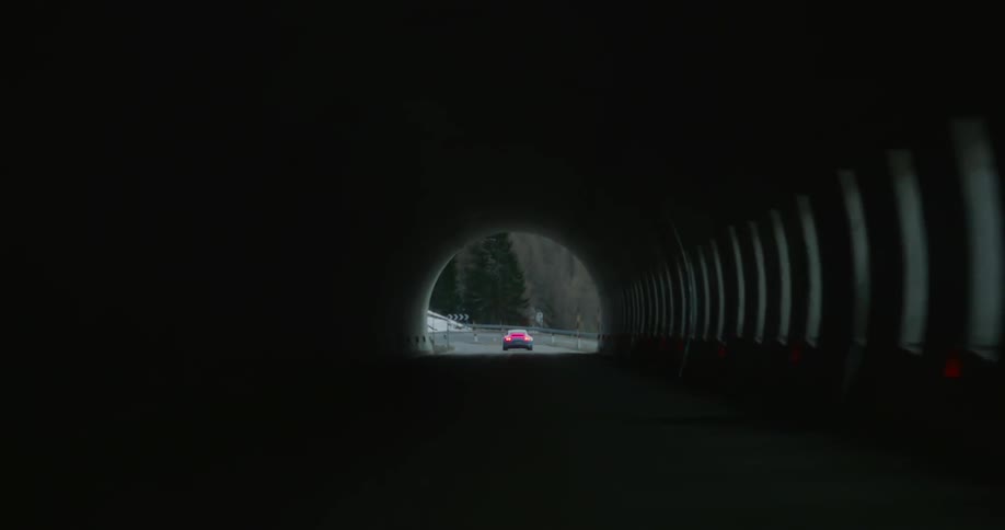 Car driving through a tunnel
