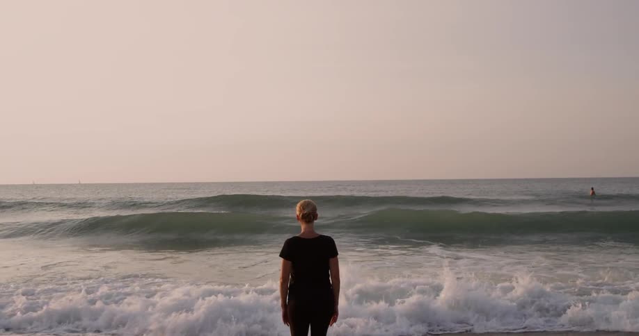 A person standing on the beach