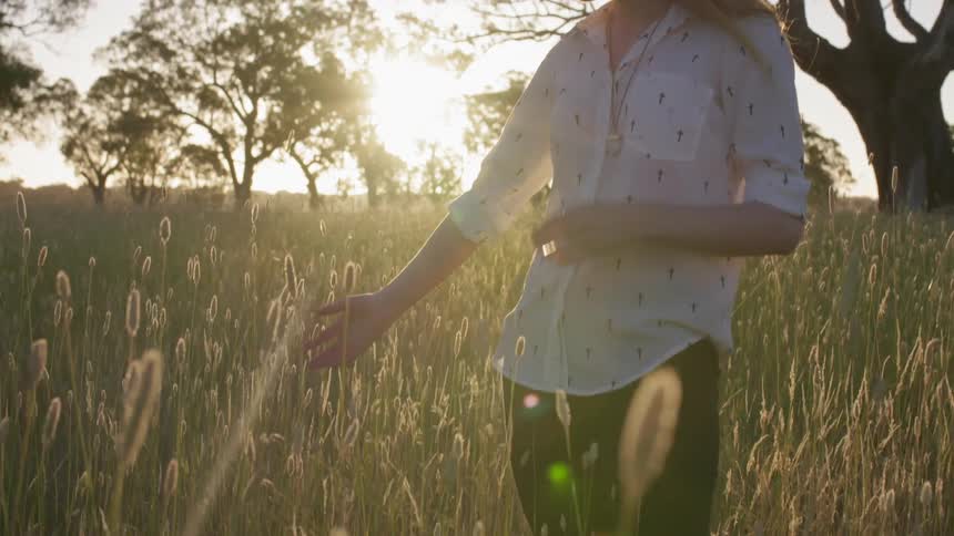 Woman In Nature And Watching Sunset