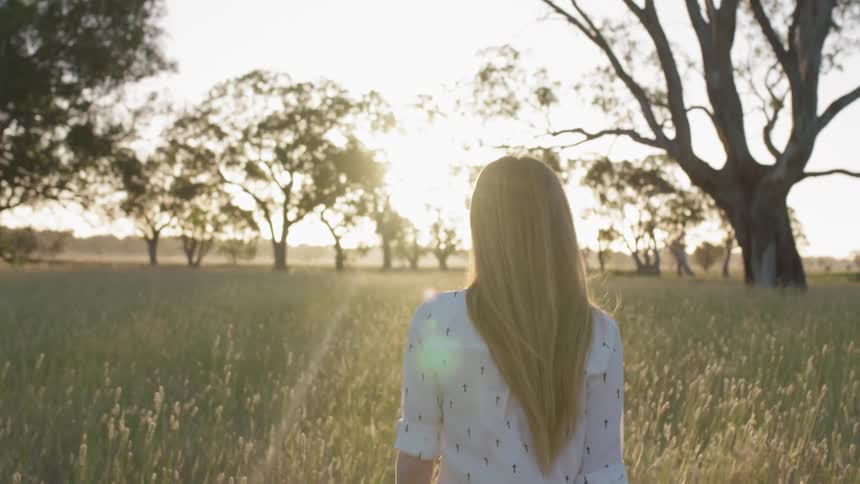 Woman In Nature And Watching Sunset
