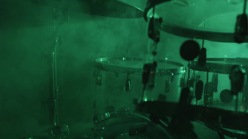 Drum set in a smoky room