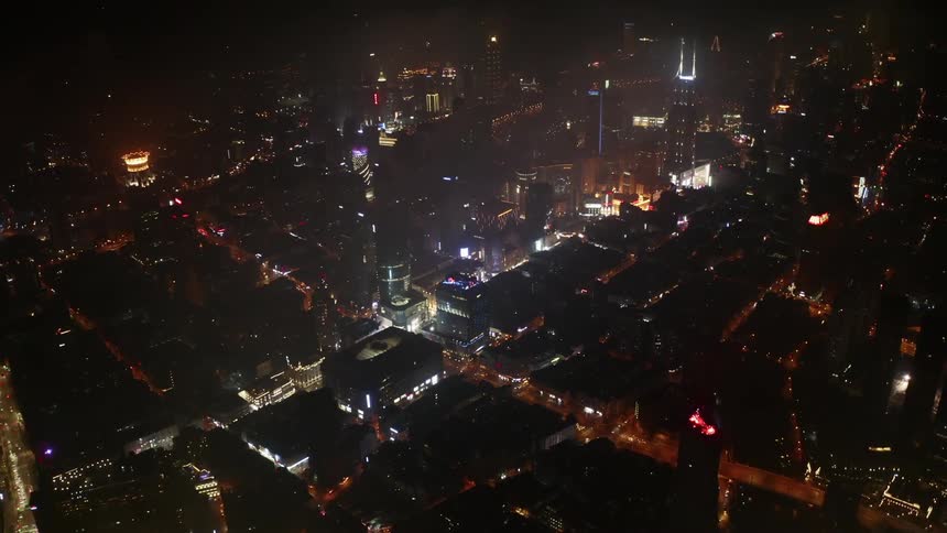 City lights illuminate the night sky