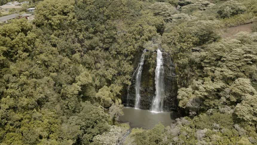 Water falls down the cliff