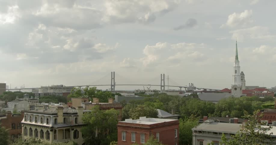 Clouds float over a town