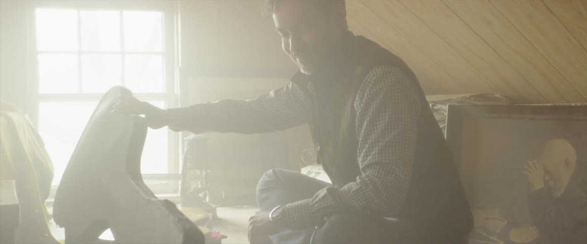 Man Finding Antiques In The Attic