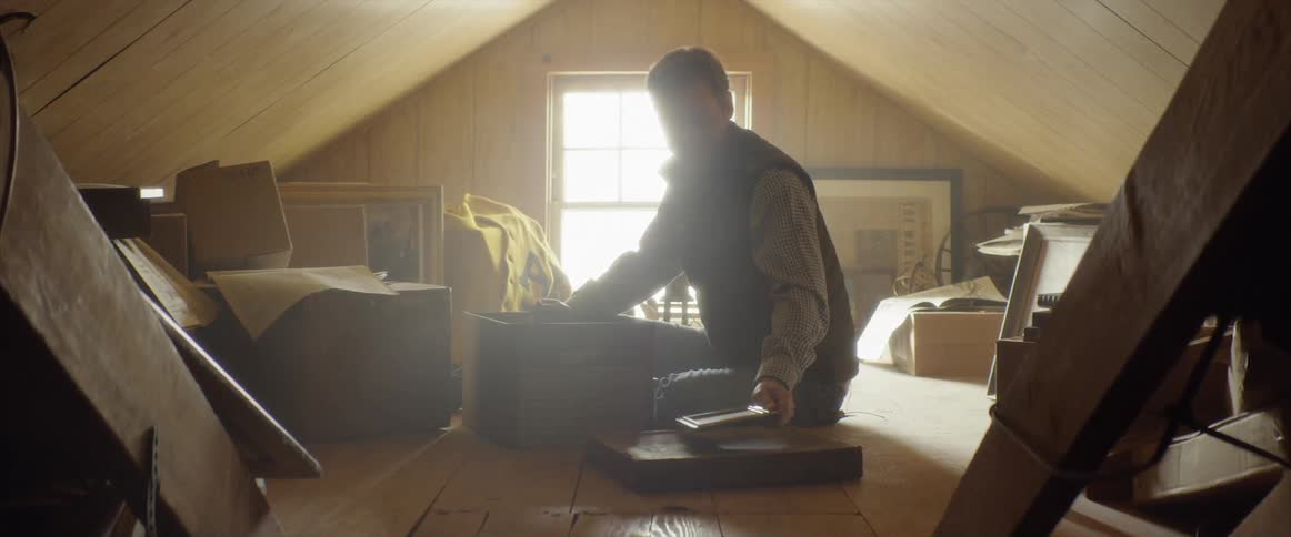 Man Finding Antiques In The Attic