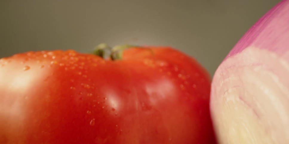 Water droplets shine off of several vegetables
